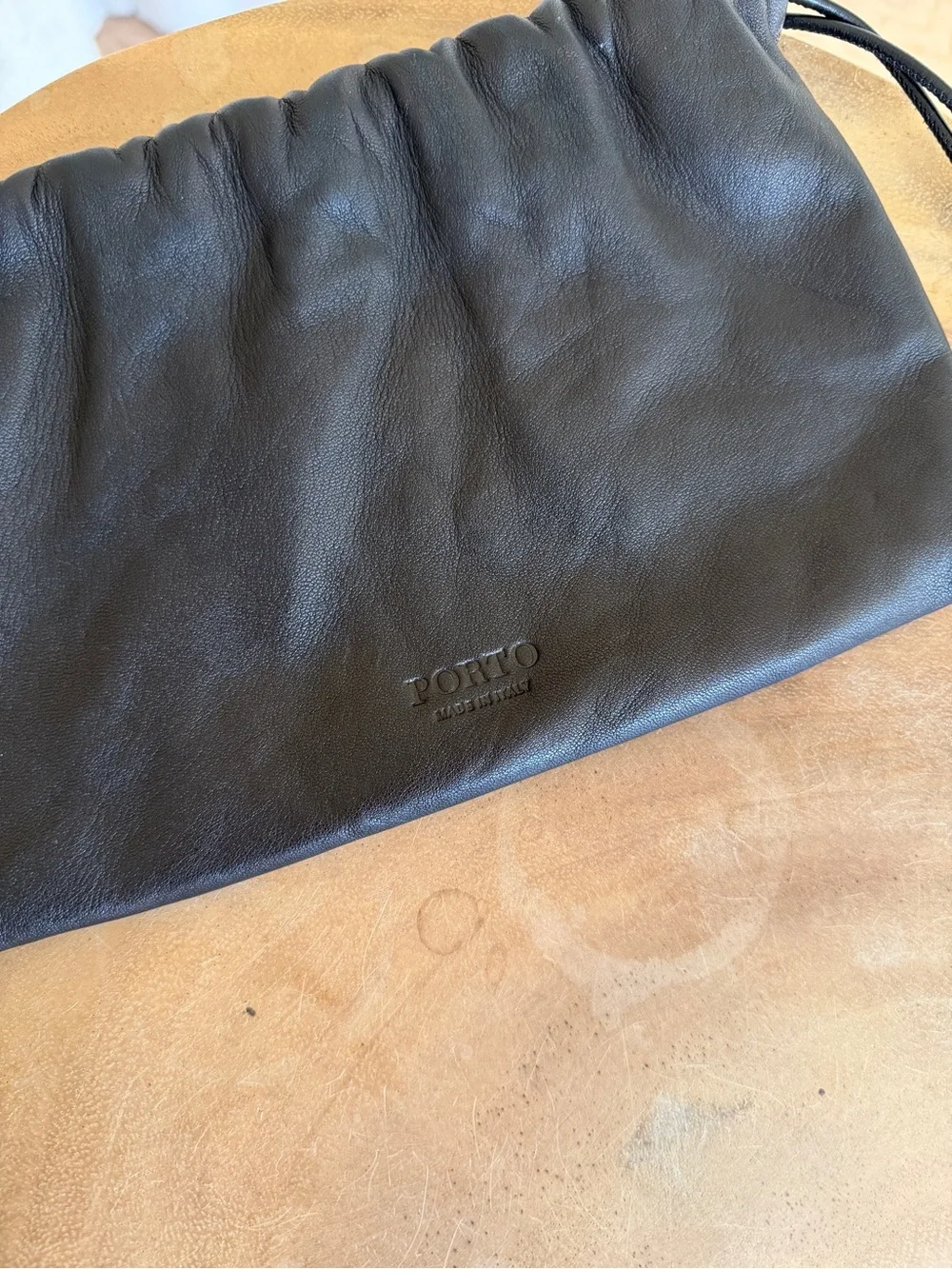 Porto Black Leather Drawstring Clutch